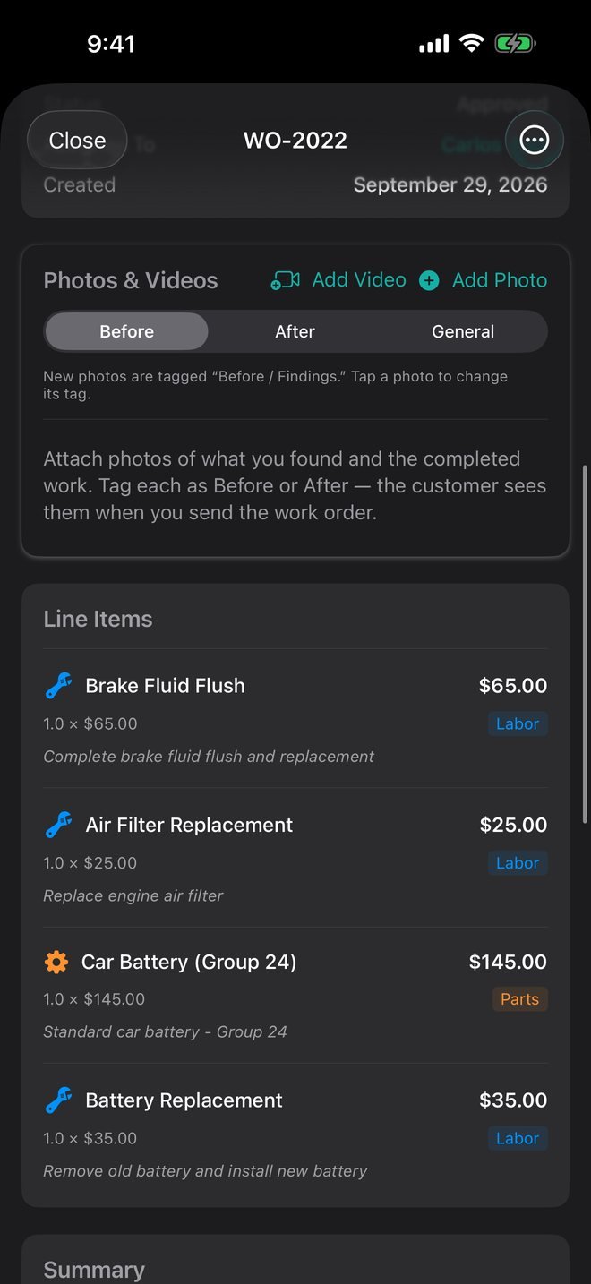 Trackara Pro app: work order WO-2022 with its photo section and line items for a brake fluid flush, an air filter and a battery